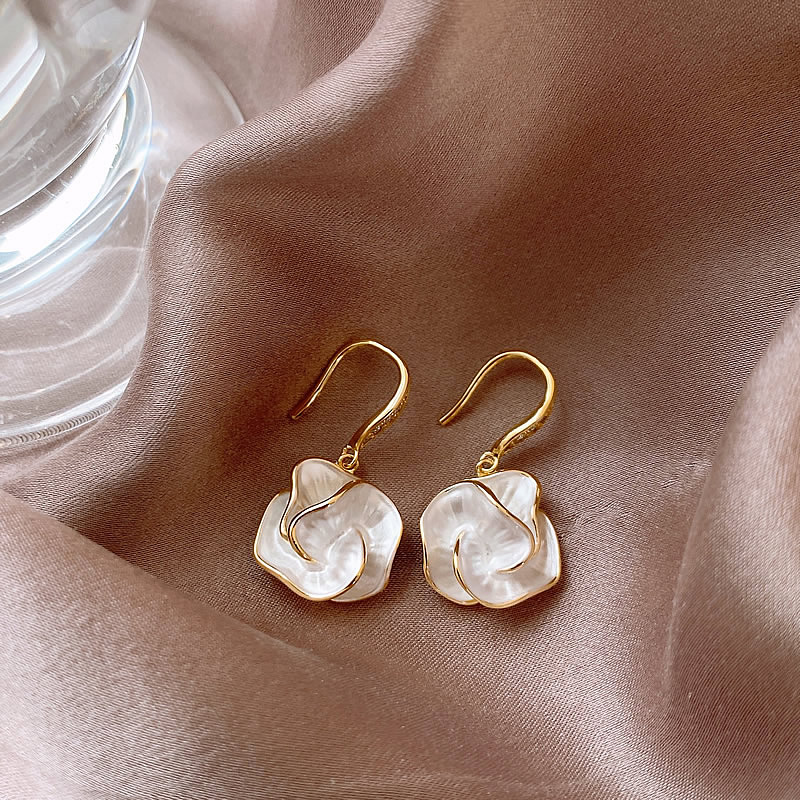 Elegant Earrings with White Petals